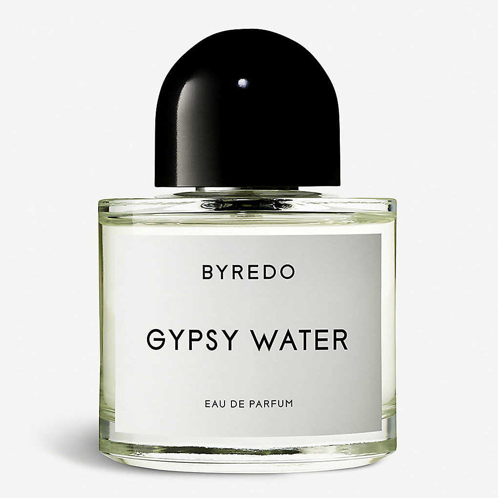 Byredo Gypsy Water Eau de Parfum bottle with a clear glass body, white label, and a glossy black dome-shaped cap, set against a light gray background.